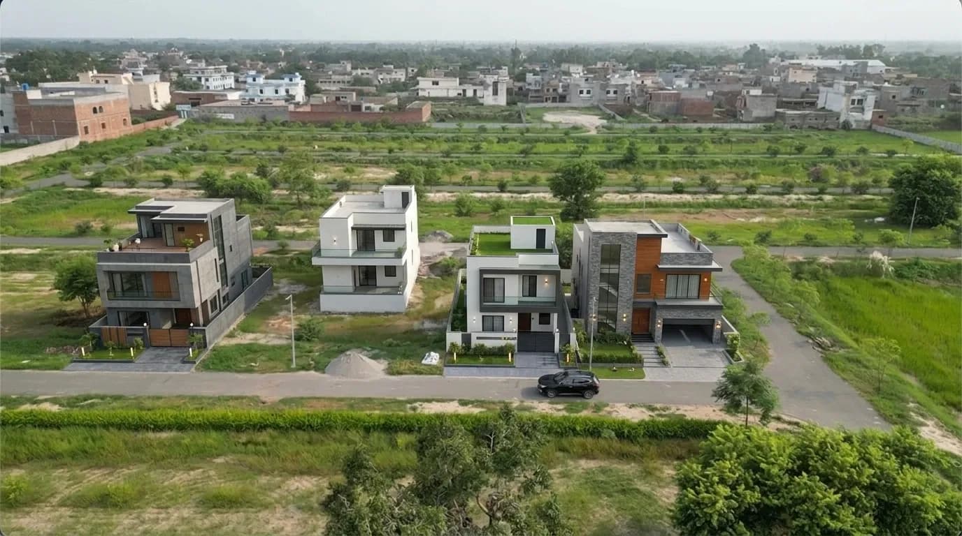 Aerial view of newly built houses along a road in Park Avenue Society
